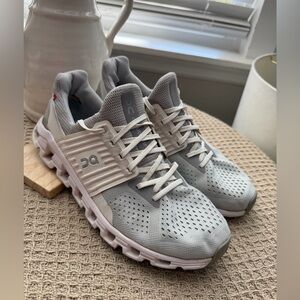 On Running Gray and White Athletic Shoes